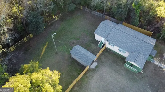 an aerial view of a house having outdoor space