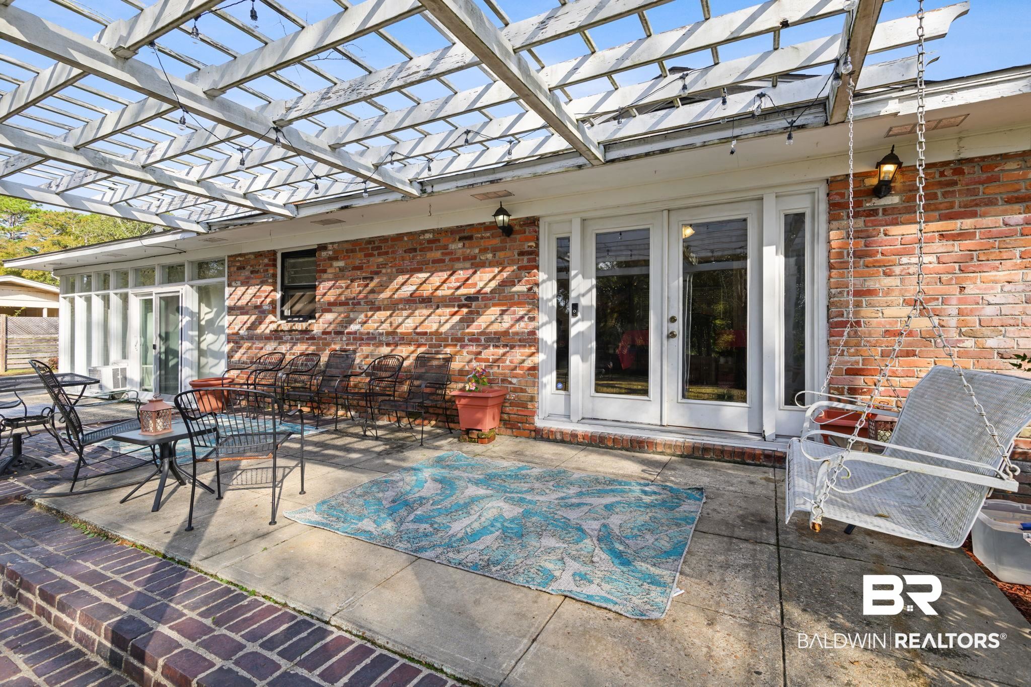 4105 Libby Drive Mobile, AL 36693 - Photo 22 of 26 View of patio / terrace with french doors and a pergola