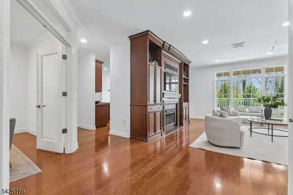 a view of livingroom with furniture and wooden floor