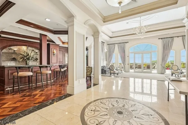 a view of a living room and dining room