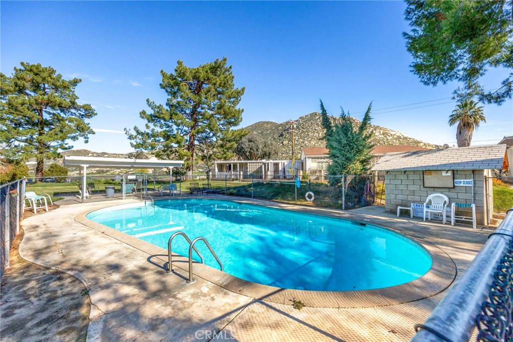 614 Gibbel Road Hemet, CA 92543 - Photo 30 of 30 a view of a swimming pool with outdoor seating