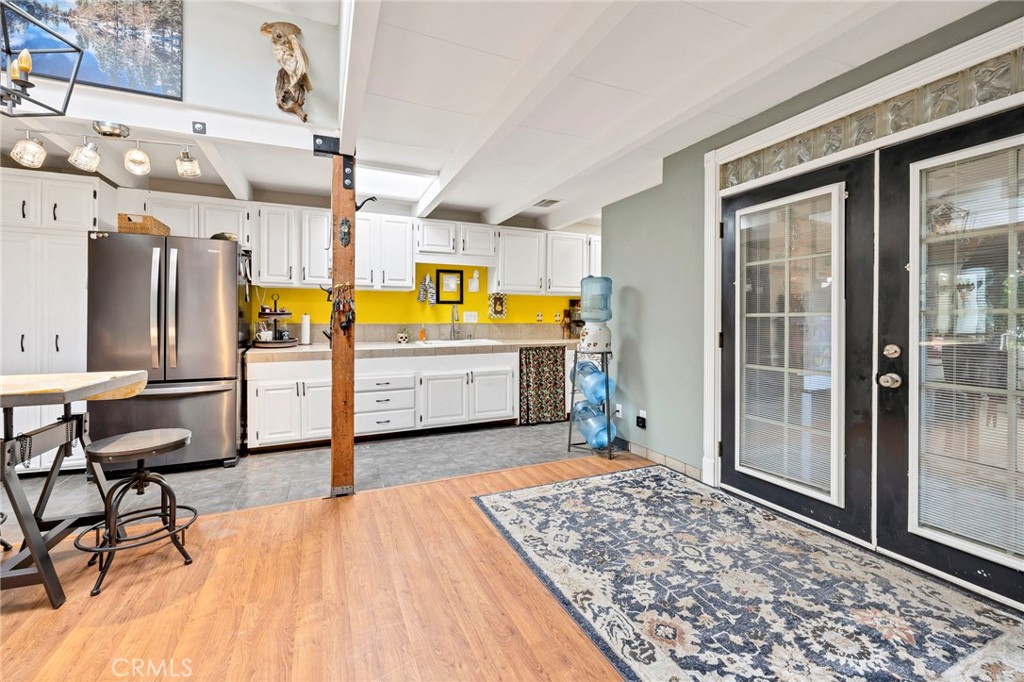 614 Gibbel Road Hemet, CA 92543 - Photo 8 of 30 a view of a kitchen with furniture and a window