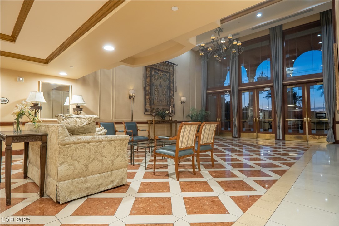 30 Strada Di Villaggio, Unit 617 Henderson, NV 89011 - Photo 29 of 34 Lobby with crown molding, recessed lighting, and a high ceiling