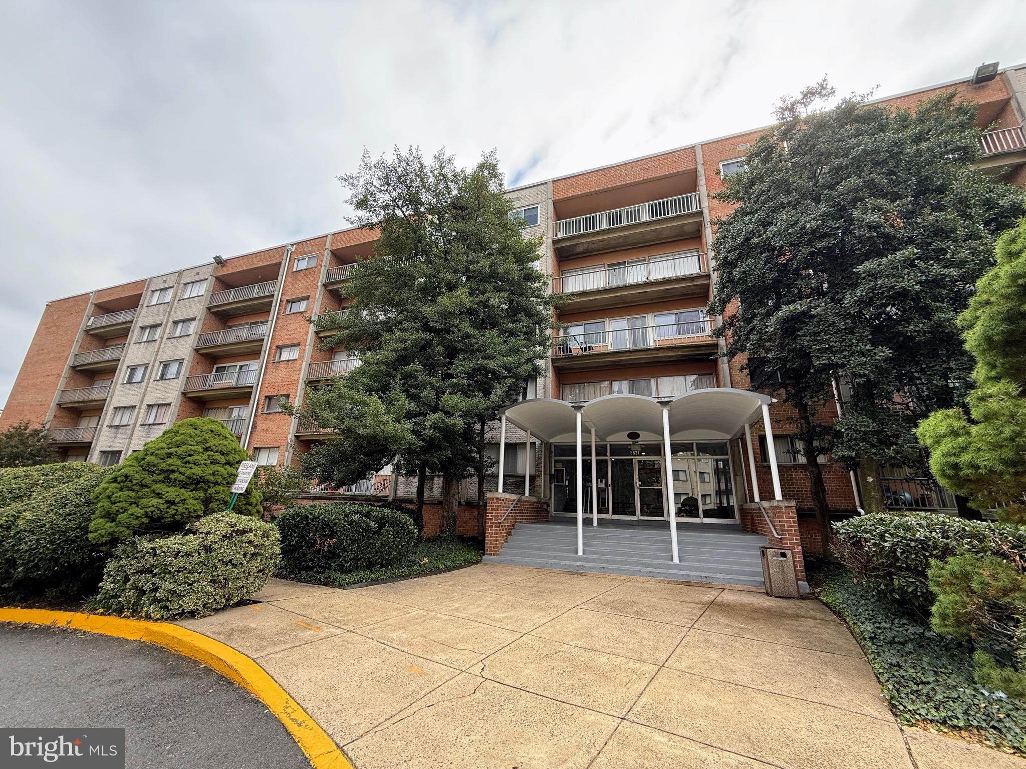 5831 Quantrell Avenue, Unit 505 Alexandria, VA 22312 - Photo 21 of 22 a view of building with outdoor space