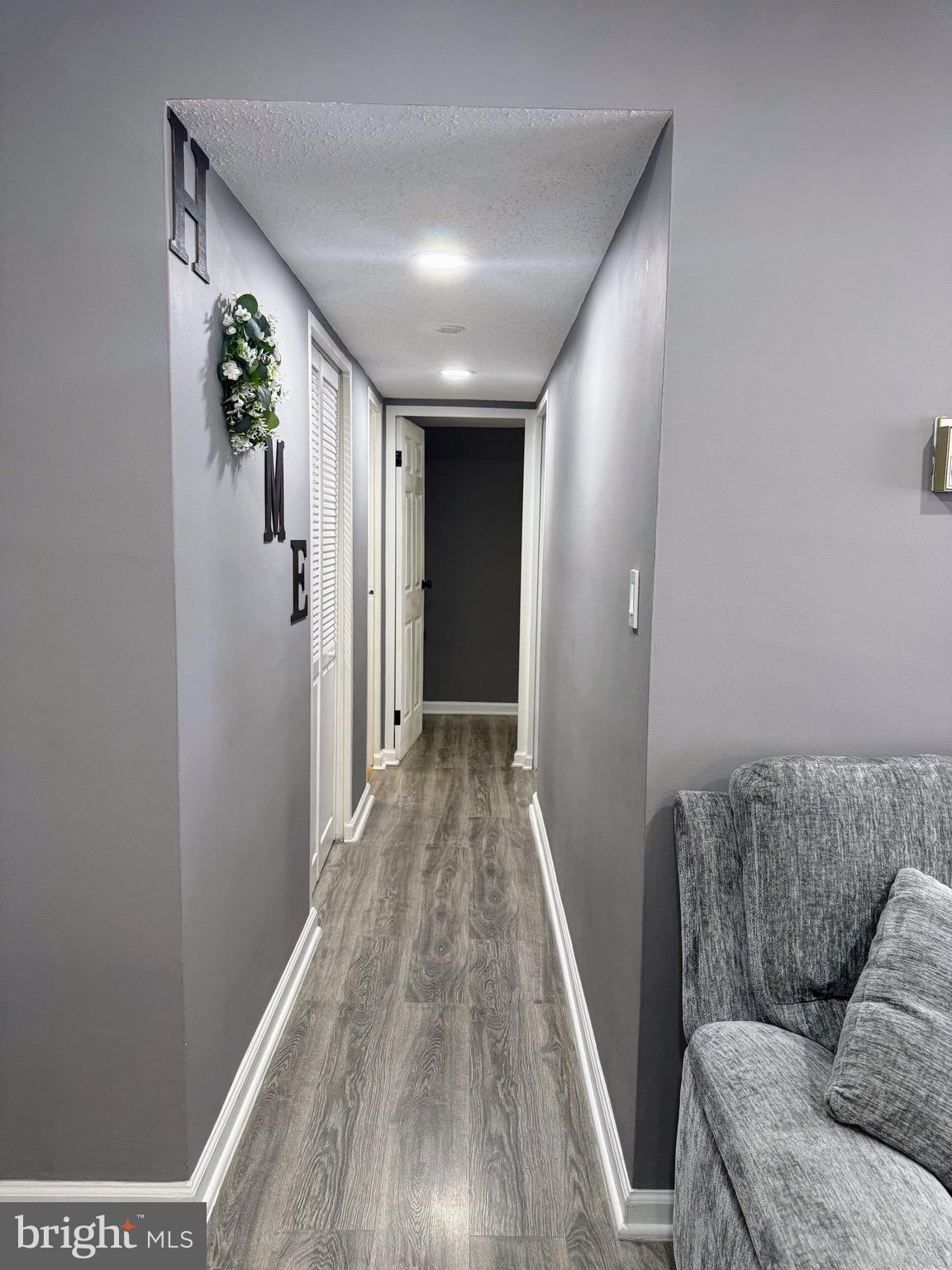 5831 Quantrell Avenue, Unit 505 Alexandria, VA 22312 - Photo 10 of 22 a view of livingroom with furniture and wooden floor