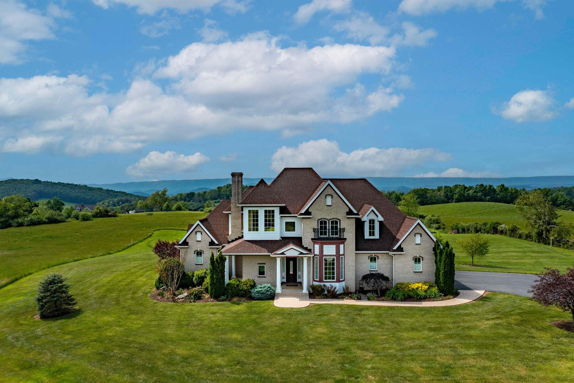 1875 Ridge Road Raphine, VA 24472 - Photo 2 of 72 an aerial view of residential houses with yard and green space
