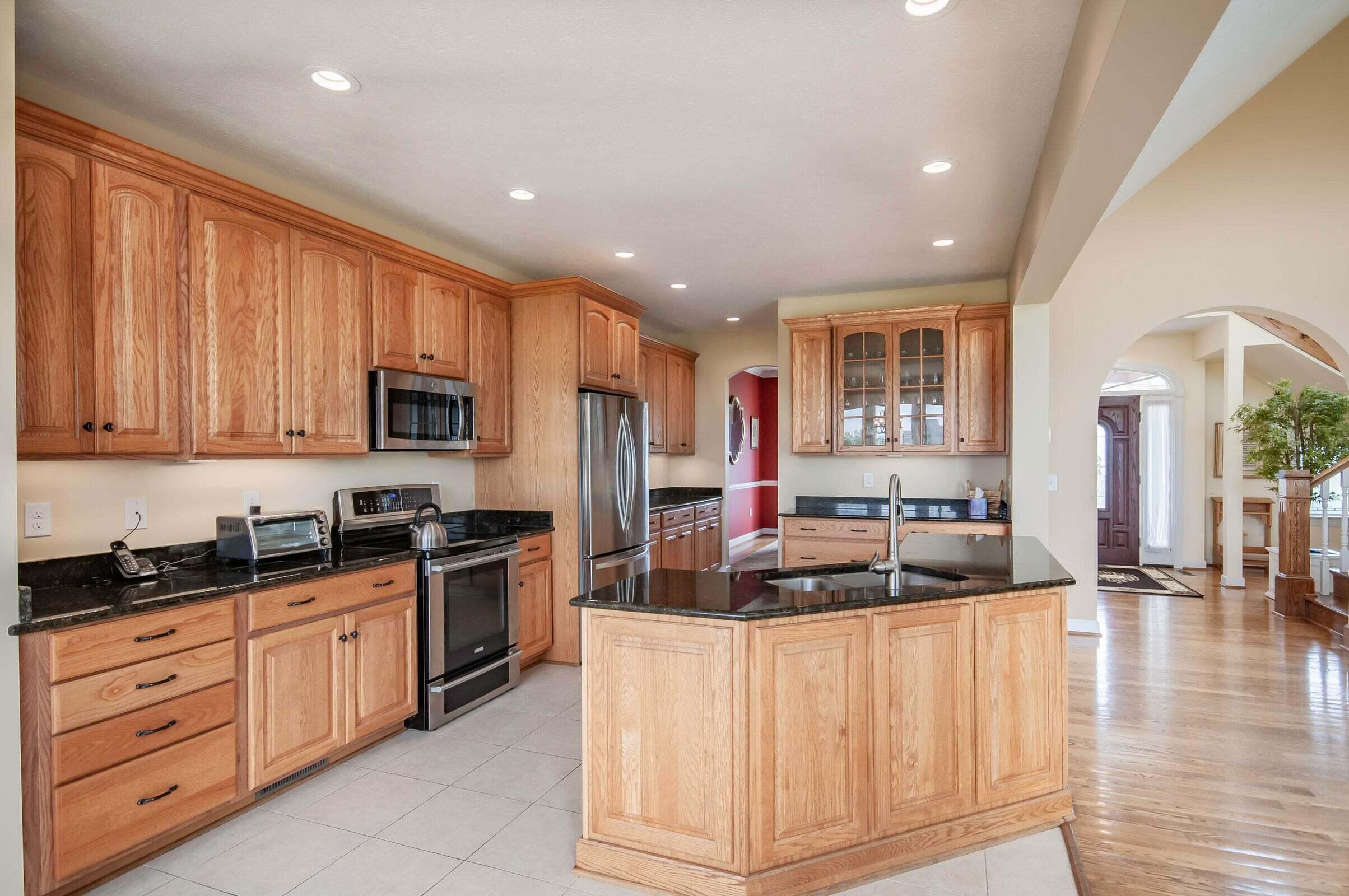 1875 Ridge Road Raphine, VA 24472 - Photo 23 of 72 a kitchen with stainless steel appliances granite countertop a stove and a sink