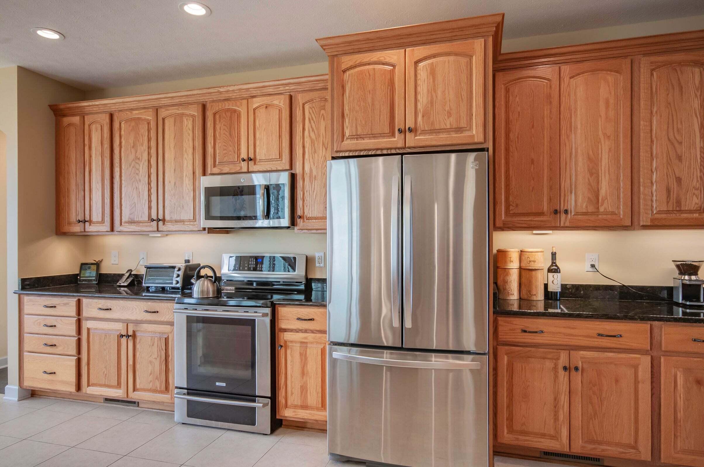 1875 Ridge Road Raphine, VA 24472 - Photo 24 of 72 a kitchen with granite countertop a refrigerator stove top oven