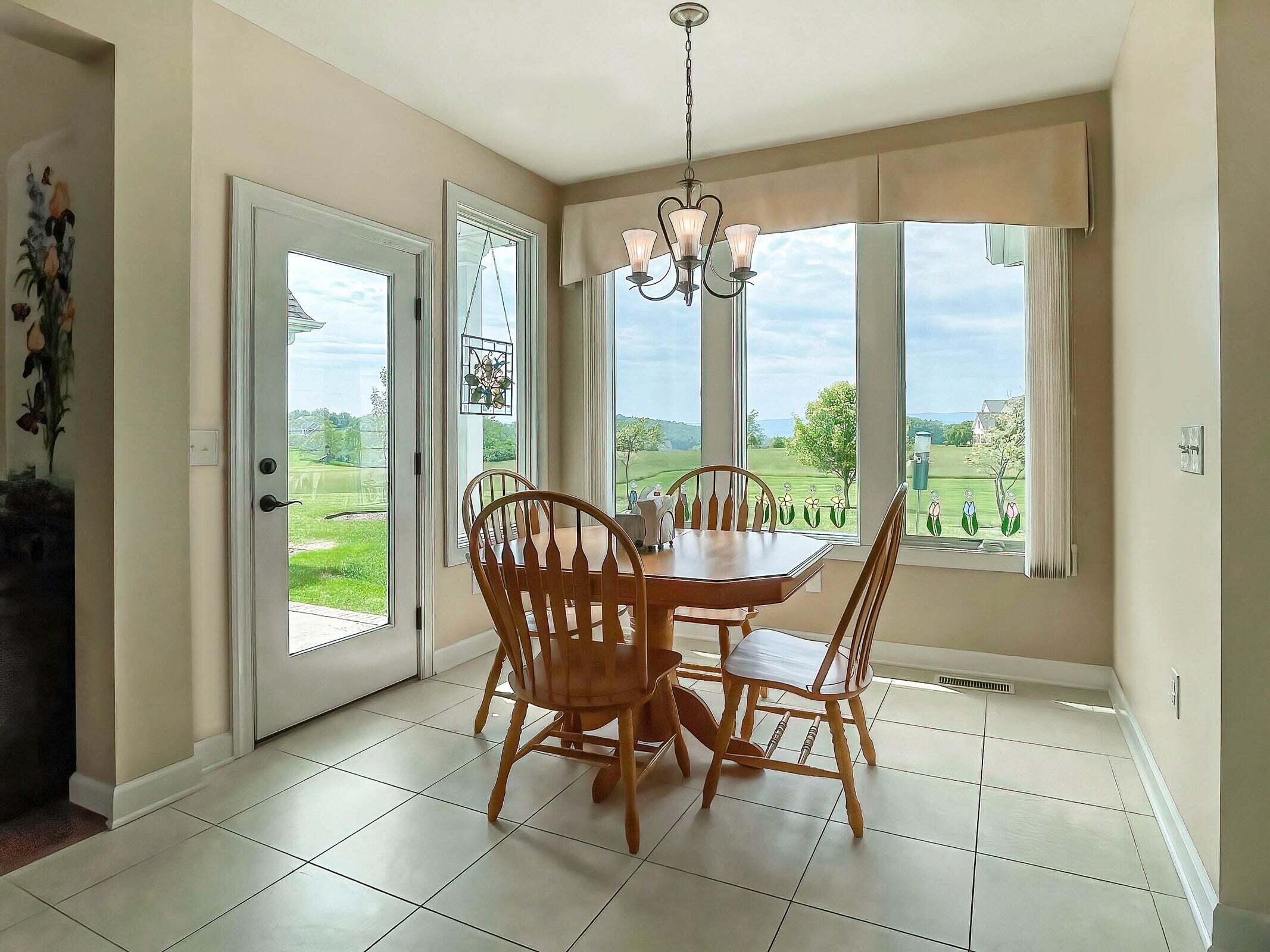 1875 Ridge Road Raphine, VA 24472 - Photo 29 of 72 a view of a dining room with furniture window and outside view