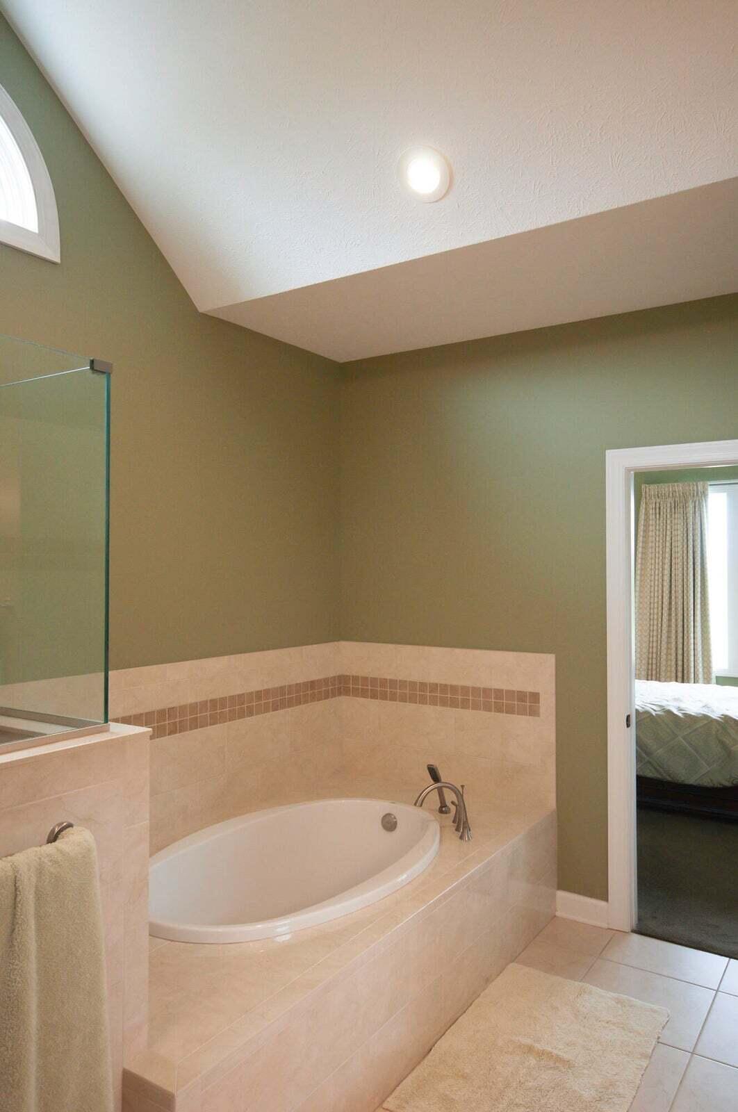 1875 Ridge Road Raphine, VA 24472 - Photo 41 of 72 a bathroom with a bathtub and a window