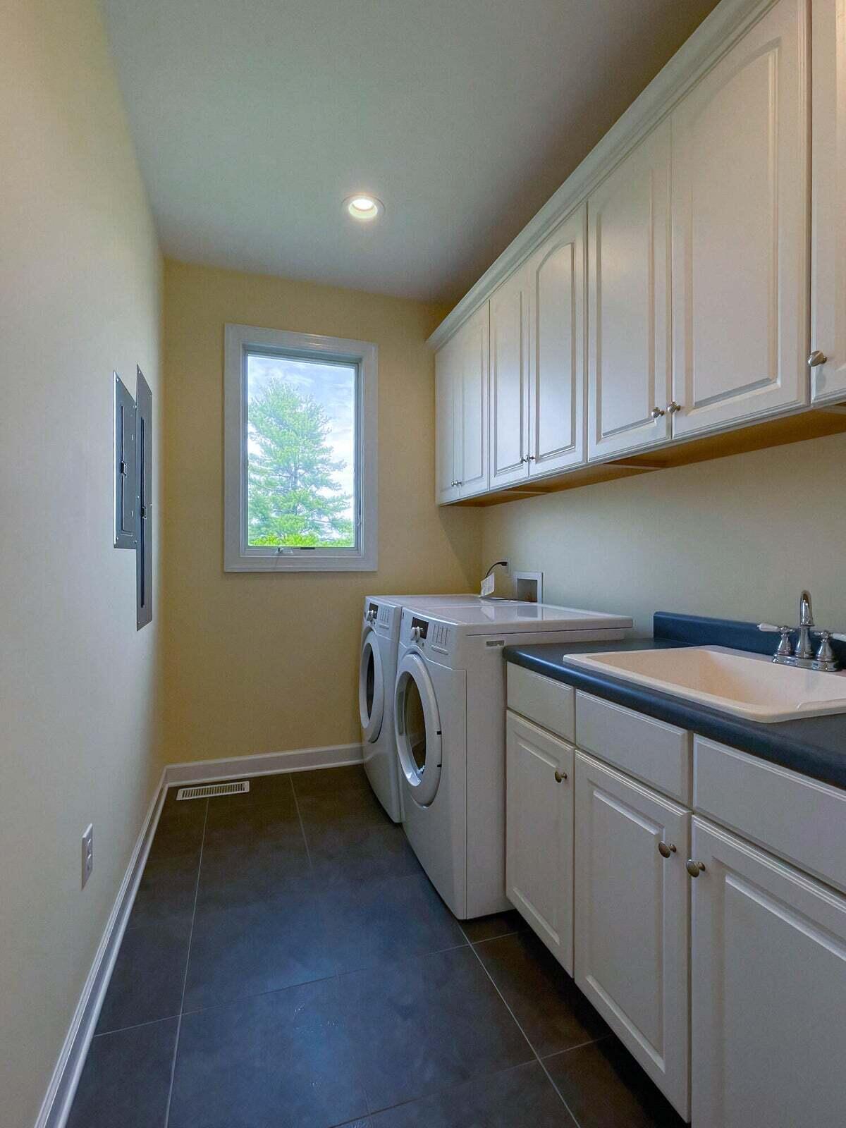 1875 Ridge Road Raphine, VA 24472 - Photo 46 of 72 a utility room with sink dryer and washer