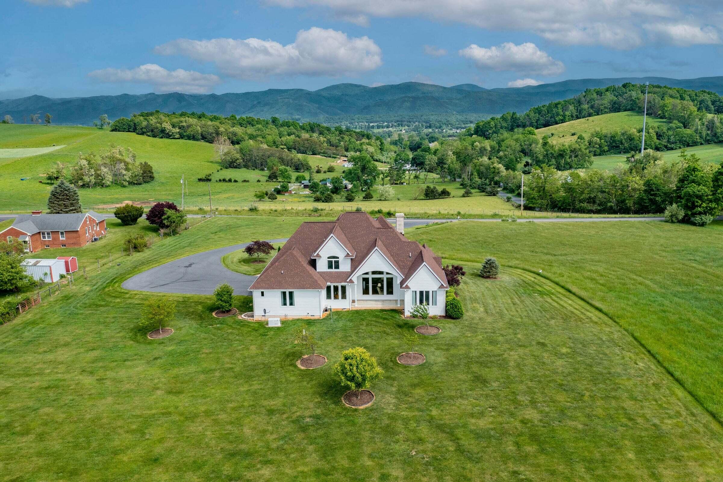 1875 Ridge Road Raphine, VA 24472 - Photo 6 of 72 a view of a houses with a big yard