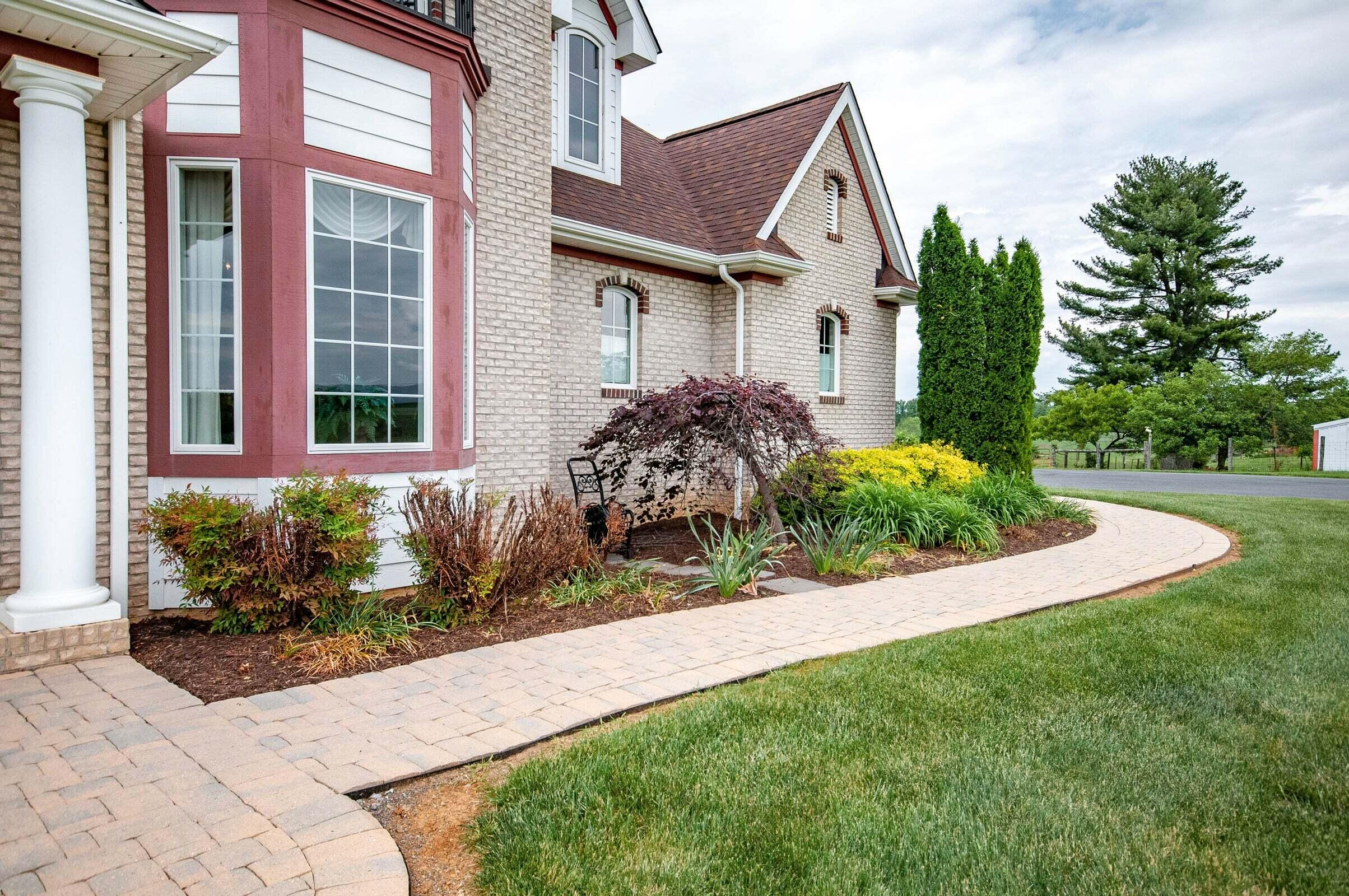 1875 Ridge Road Raphine, VA 24472 - Photo 8 of 72 a front view of a house with garden