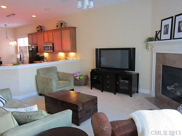 435 Third Baxter Street Fort Mill, SC 29708 - Photo 2 of 12 a living room with furniture and a flat screen tv