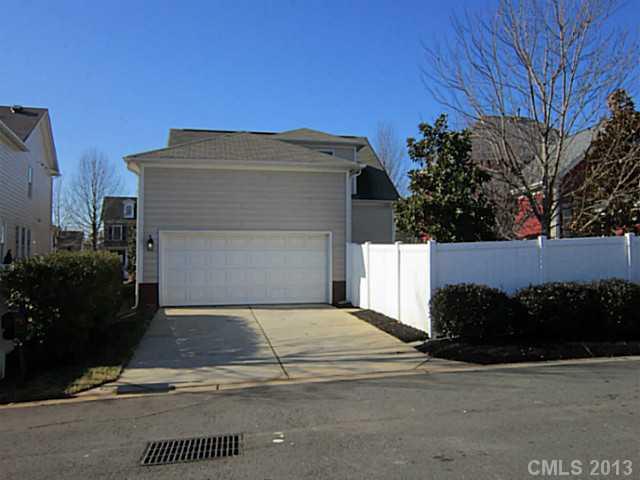 435 Third Baxter Street Fort Mill, SC 29708 - Photo 11 of 12 a view of a house with a yard