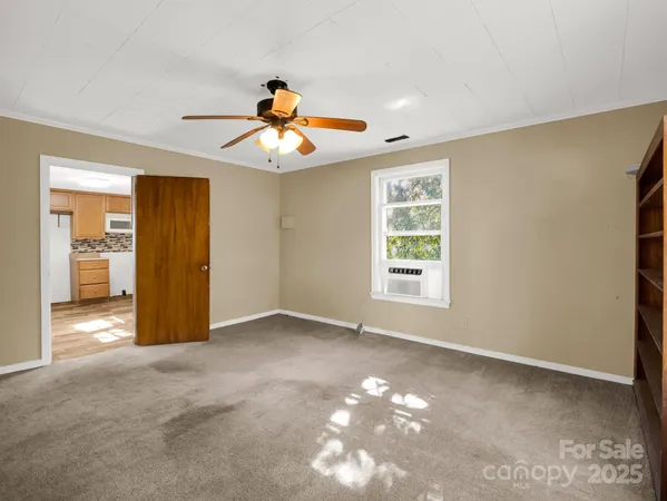 a view of an empty room with window