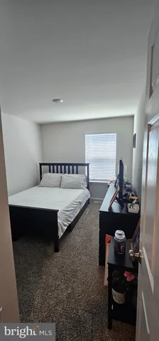 a living room with hard wood floor