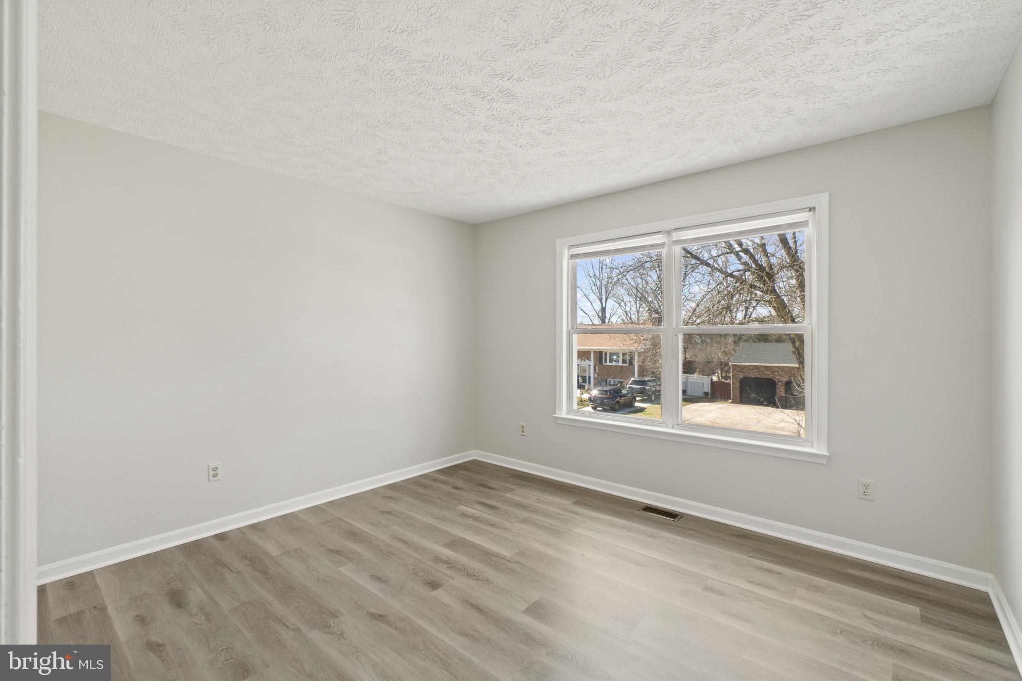 607 Brentwood Road Linthicum Heights, MD 21090 - Photo 17 of 31 an empty room with a window