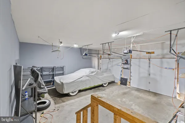 a utility room with multiple cabinets
