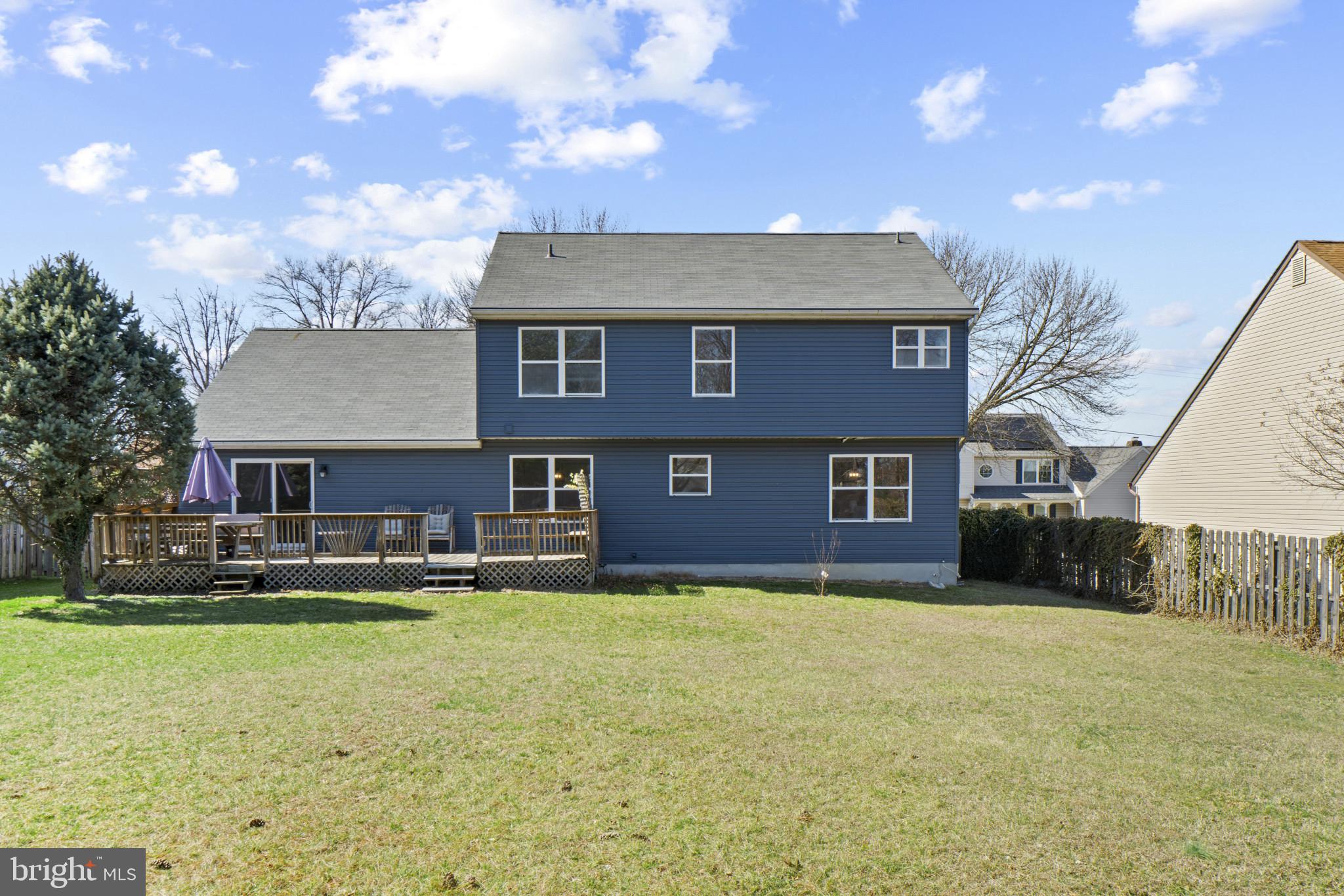 607 Brentwood Road Linthicum Heights, MD 21090 - Photo 30 of 31 a front view of a house with a yard and a garage