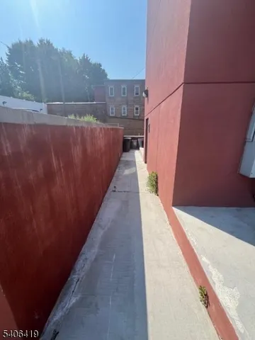 a view of a street with sitting area