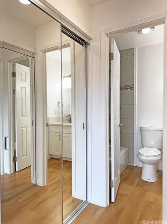 a bathroom with a shower and a toilet