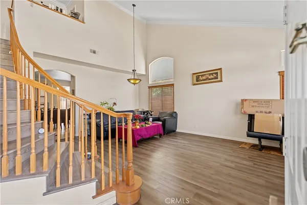 a view of entryway with wooden floor