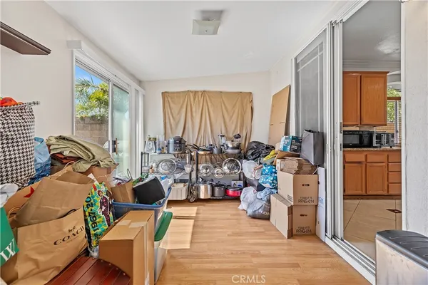 a living room filled with furniture and a table