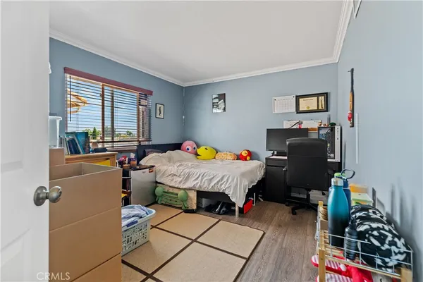 a bed room with furniture and a window