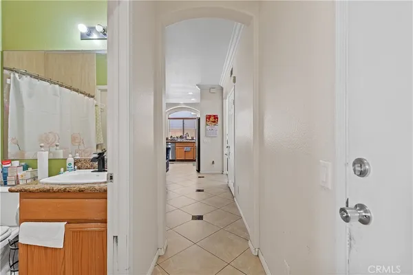 walk in closet with wooden floor