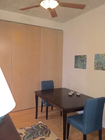 a view of a workspace with furniture