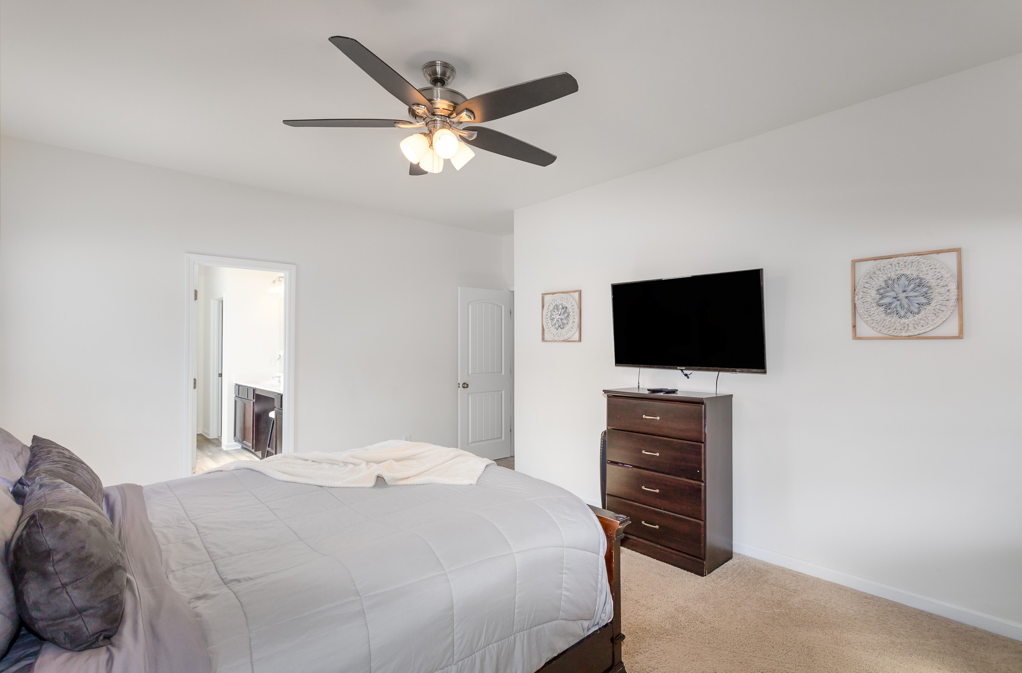 525 Burchell Lane Columbia, TN 38401 - Photo 21 of 35 a bedroom with a bed and a flat screen tv