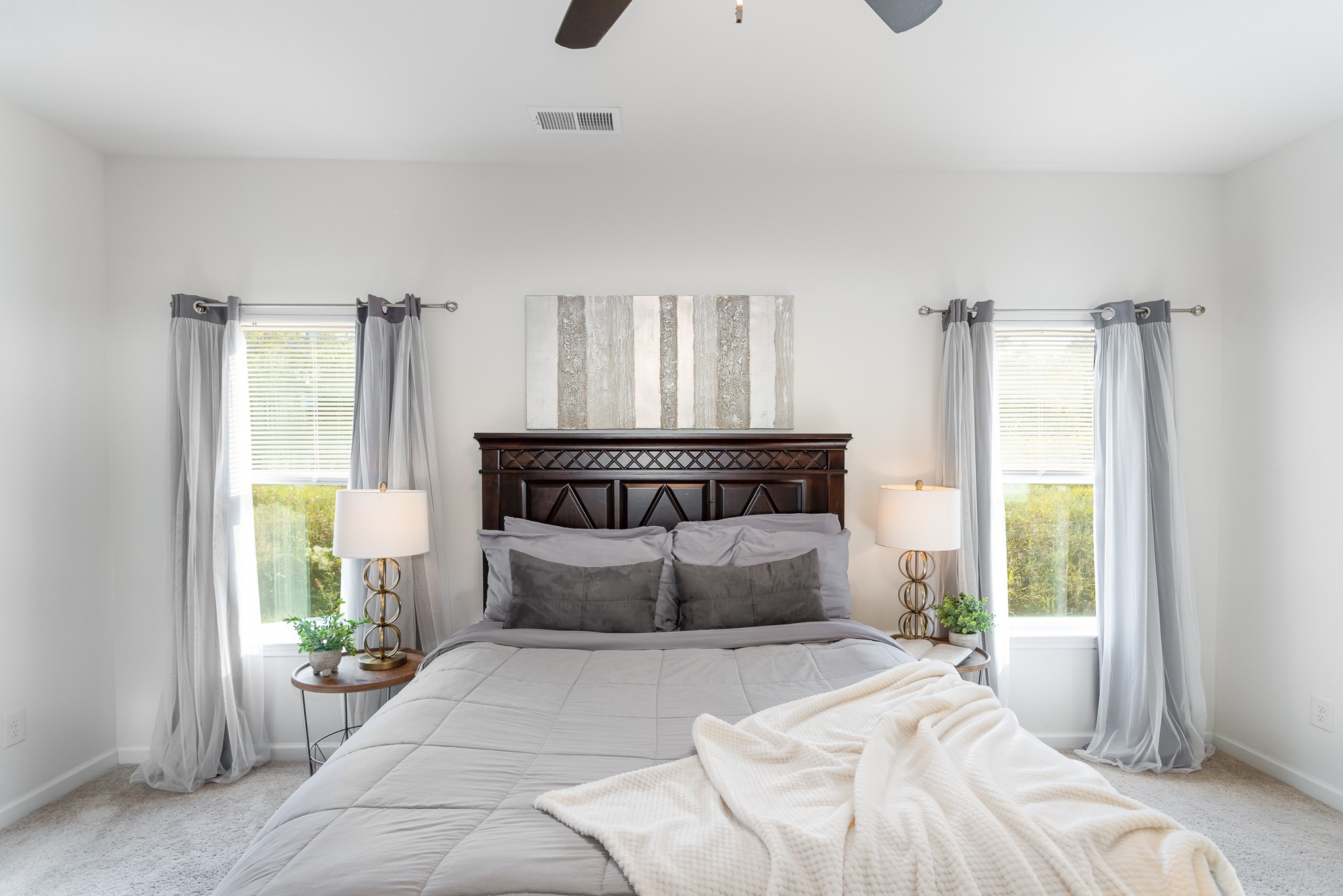 525 Burchell Lane Columbia, TN 38401 - Photo 22 of 35 a bedroom with a large bed and a large window