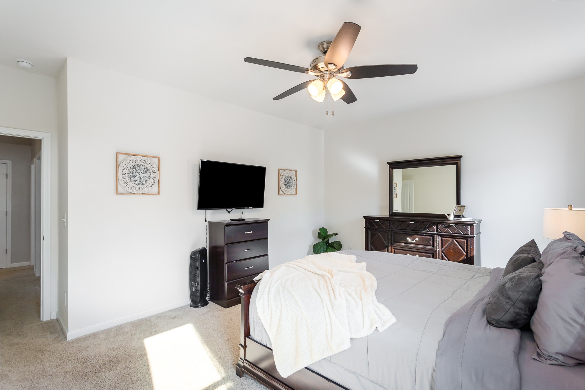 525 Burchell Lane Columbia, TN 38401 - Photo 23 of 35 a bedroom with a bed and a flat screen tv