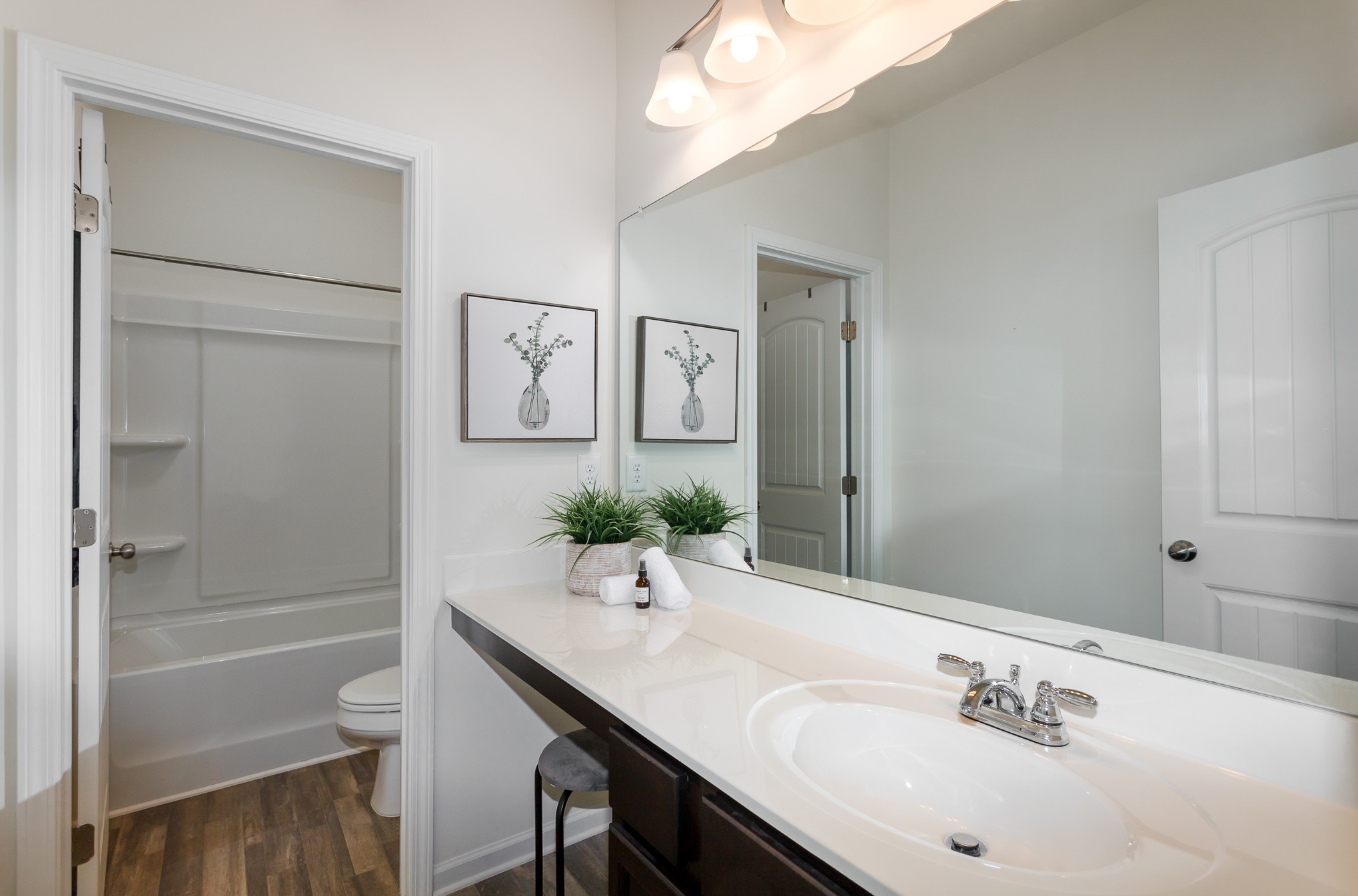 525 Burchell Lane Columbia, TN 38401 - Photo 29 of 35 a bathroom with a granite countertop sink a toilet and shower