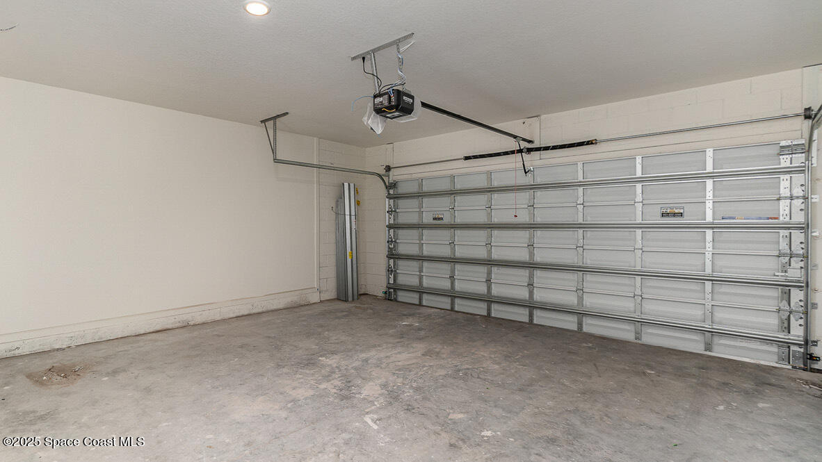 598 Ganley Street Palm Bay, FL 32908 - Photo 19 of 25 a view of a garage