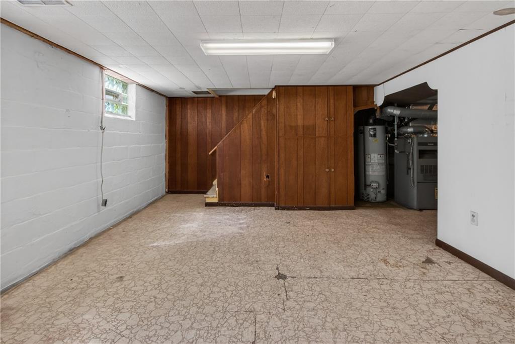 1420 Homestead Road Verona, PA 15147 - Photo 26 of 34 an empty room with closet and natural light