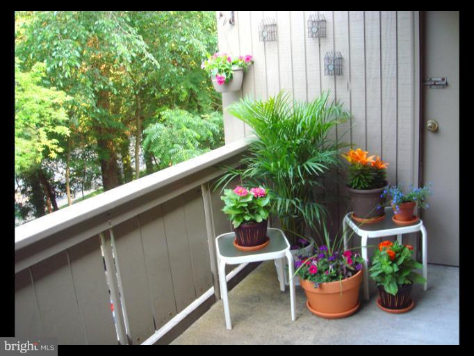 109 Cross Keys Road, Unit R109E Baltimore, MD 21210 - Photo 3 of 30 Exterior Balcony off Dining Room