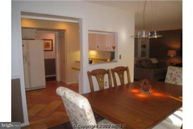 109 Cross Keys Road, Unit R109E Baltimore, MD 21210 - Photo 8 of 30 Dining Room overlooking balcony