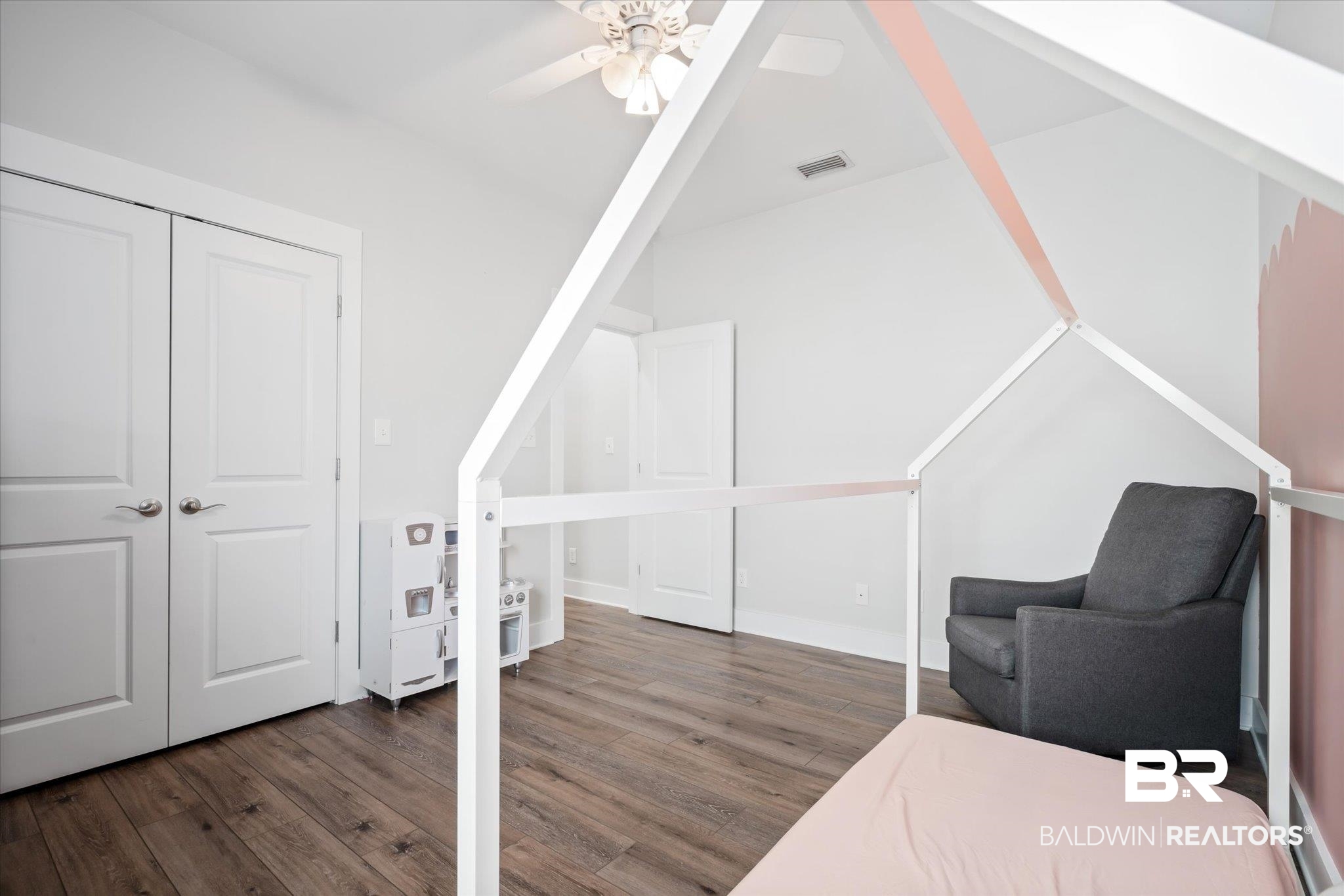 8056 Carmel Circle Foley, AL 36535 - Photo 19 of 28 Bedroom with ceiling fan and dark hardwood / wood-style flooring