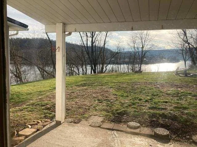 a view of a backyard of a house