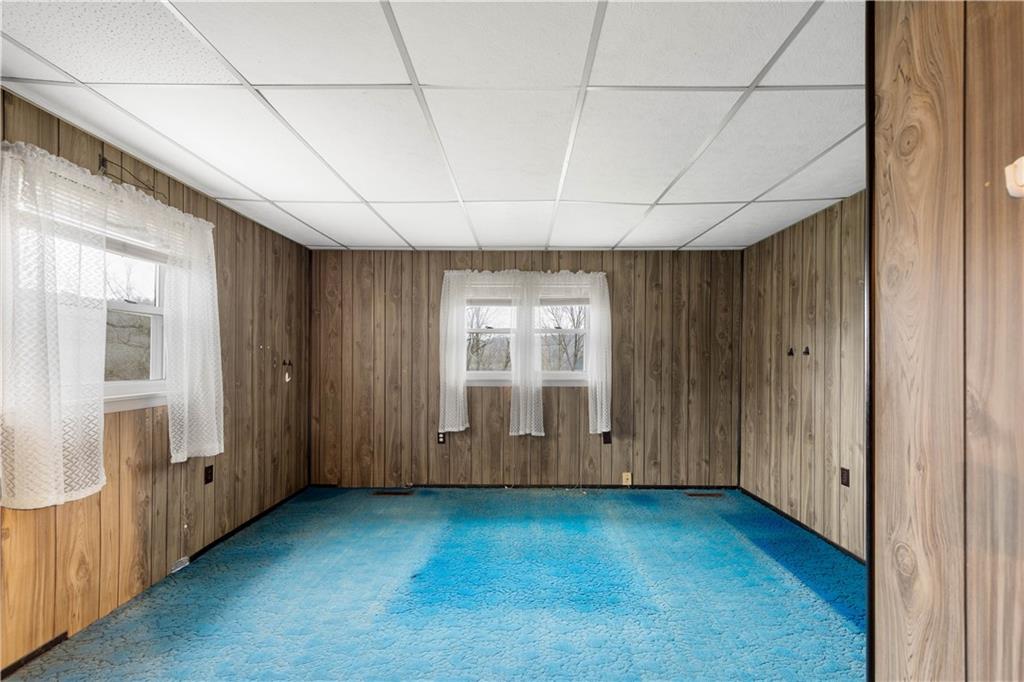 107 Center Street Millsboro, PA 15348 - Photo 17 of 34 a view of an empty room with a window