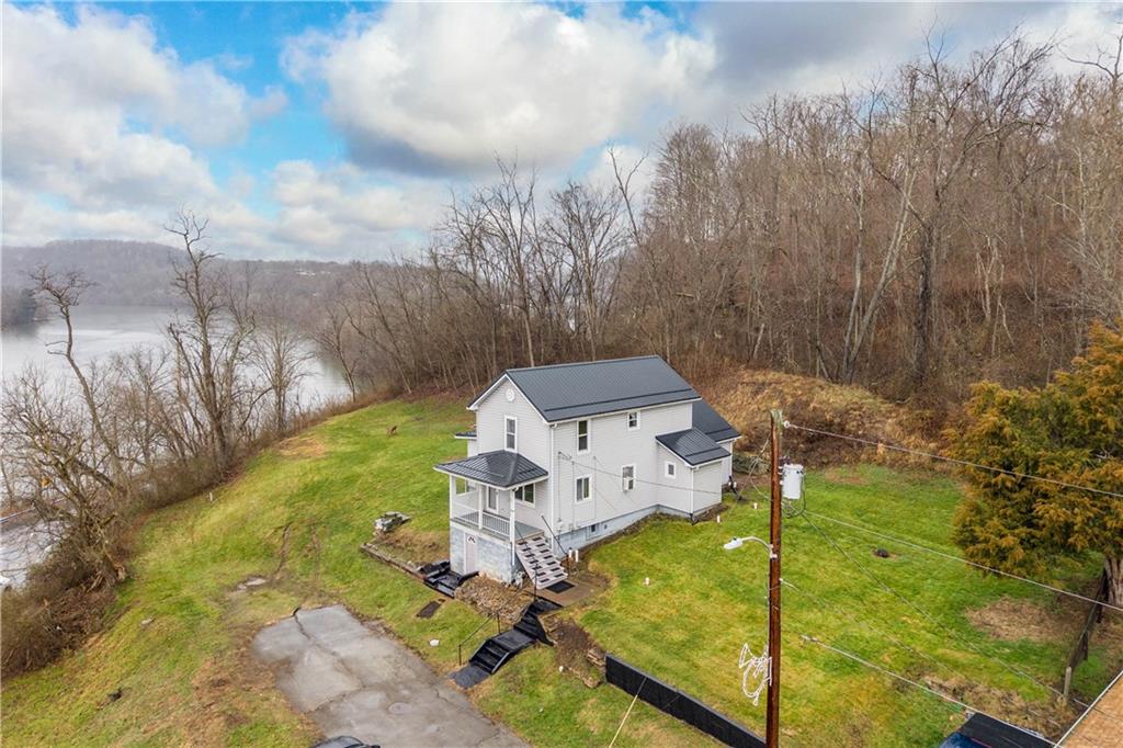 107 Center Street Millsboro, PA 15348 - Photo 2 of 34 a view of yard with swimming pool