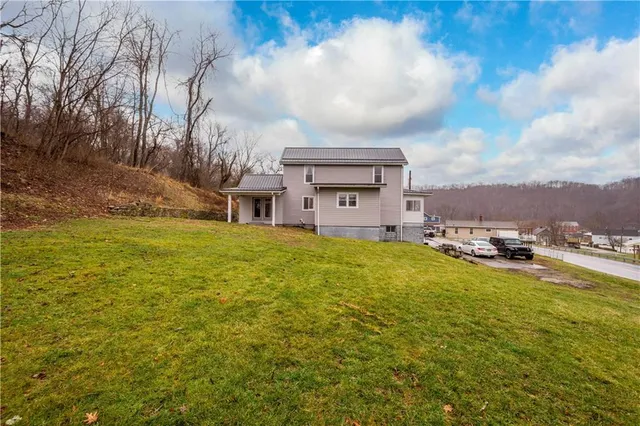 a view of swimming pool with an outdoor space and seating area