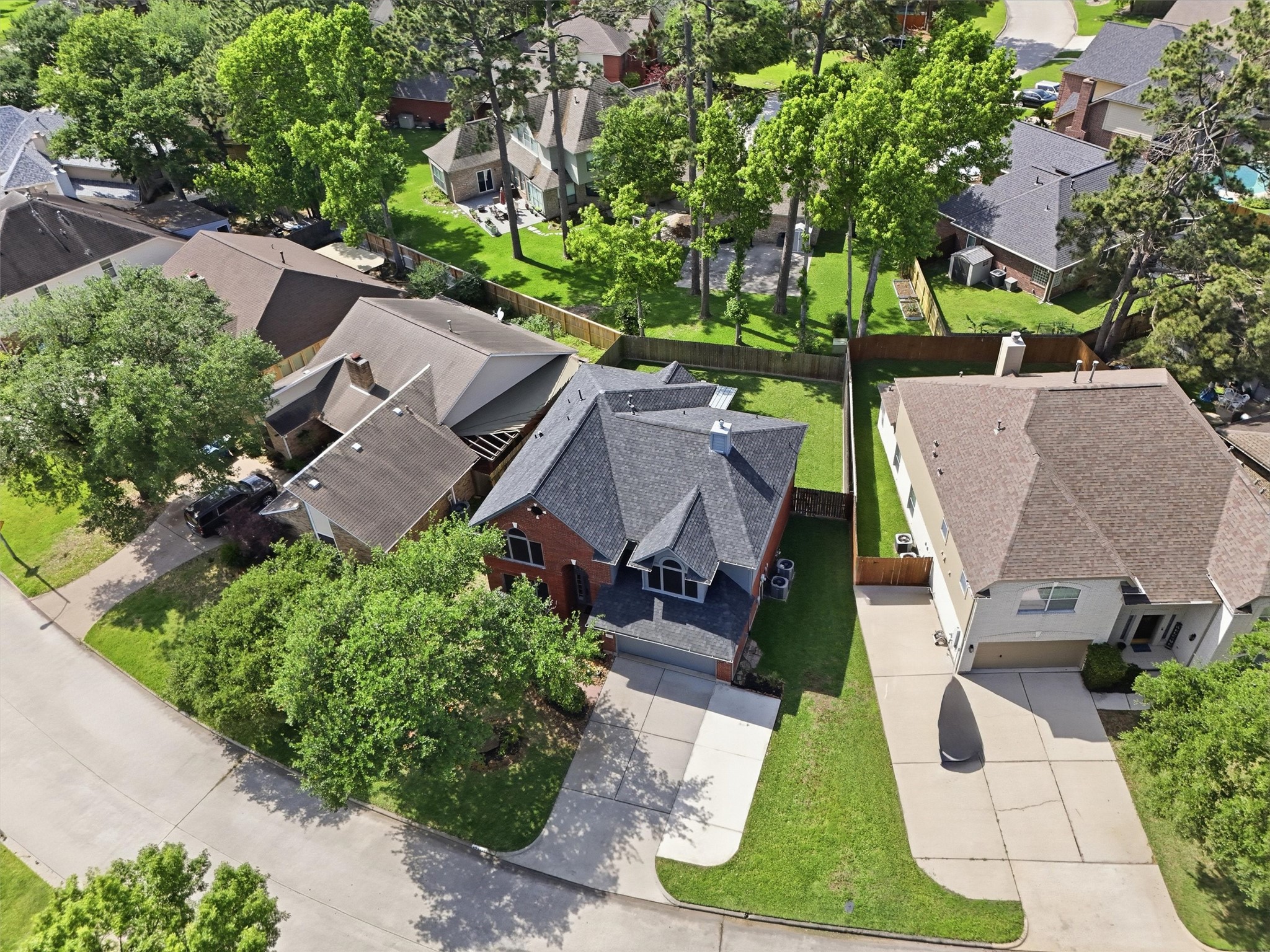 8827 Mile Run Road Humble, TX 77346 - Photo 29 of 37 an aerial view of a house with a garden