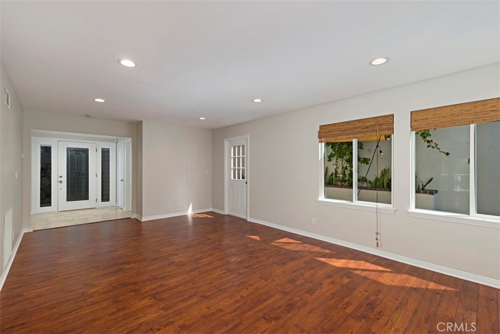 33852 Orilla Road Dana Point, CA 92629 - Photo 17 of 49 a view of an empty room with wooden floor and a window
