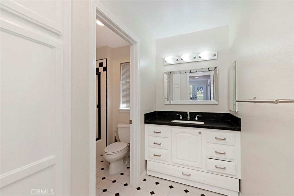 33852 Orilla Road Dana Point, CA 92629 - Photo 30 of 49 a utility room with cabinets washer and dryer