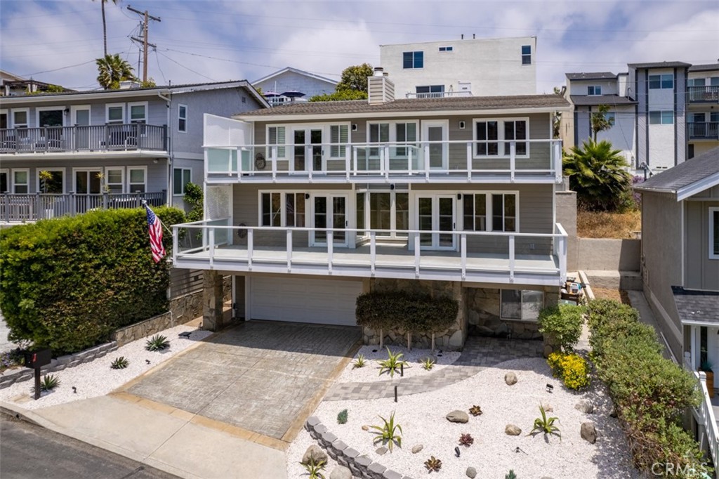 33852 Orilla Road Dana Point, CA 92629 - Photo 3 of 49 a balcony with table and chairs