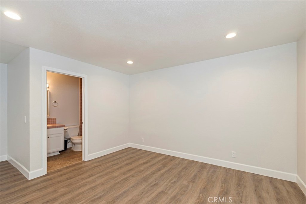 33852 Orilla Road Dana Point, CA 92629 - Photo 34 of 49 a view of room with wooden floor and bathroom view