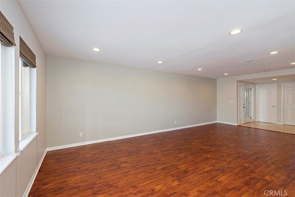 33852 Orilla Road Dana Point, CA 92629 - Photo 9 of 49 an empty room with wooden floor and window